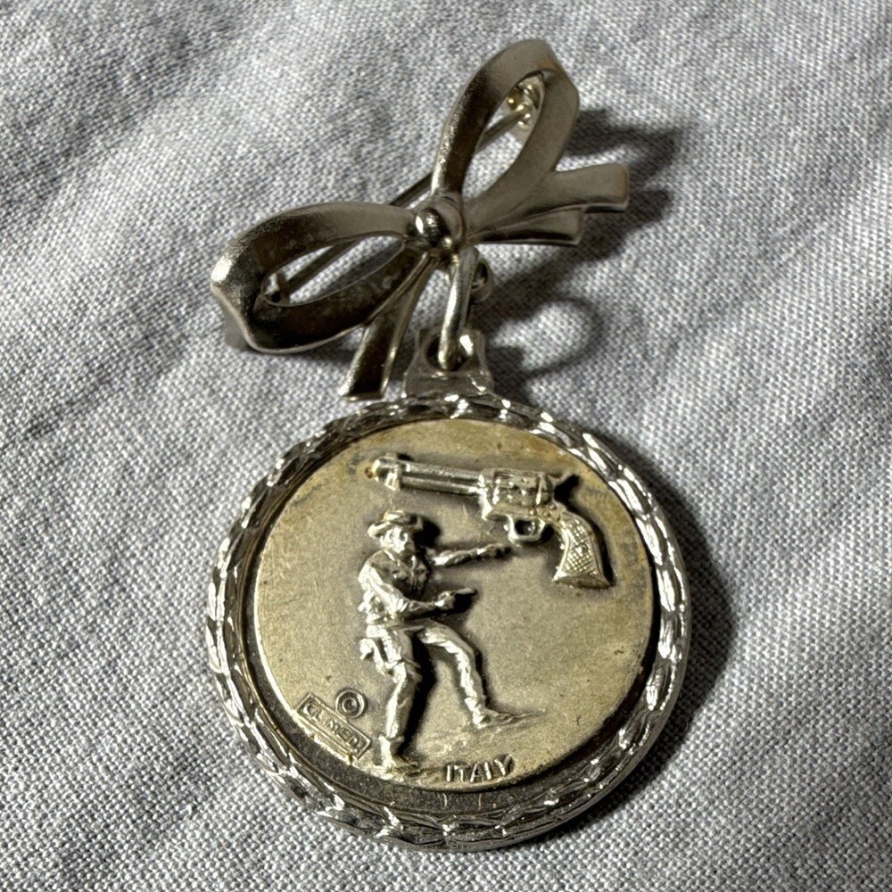 Vintage Italian Silver-Tone Medal Brooch Featuring Cowboy Motif